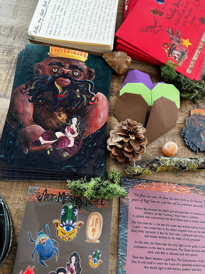 Collection of fantasy-themed cards and stationery items on a wooden surface